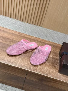 Alaia Fishnet Flat Mules Pink