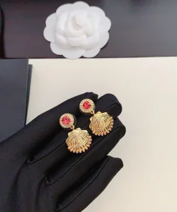 Chanel Crystal CC Gold Shell Earrings 