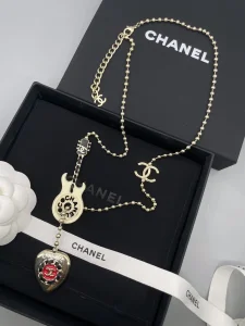 Chanel Guitar CC Logo Gold Necklaces