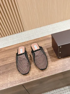 Alaia Black Fishnet Flat Mules