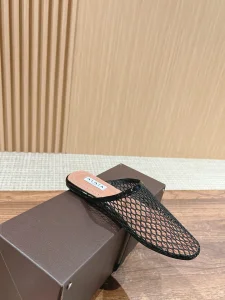 Alaia Black Fishnet Flat Mules